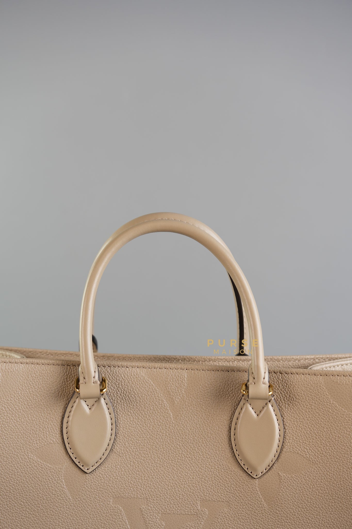 OnTheGo (OTG) MM Tourterelle Empreinte Monogram (Microchip) | Purse Maison Luxury Bags Shop