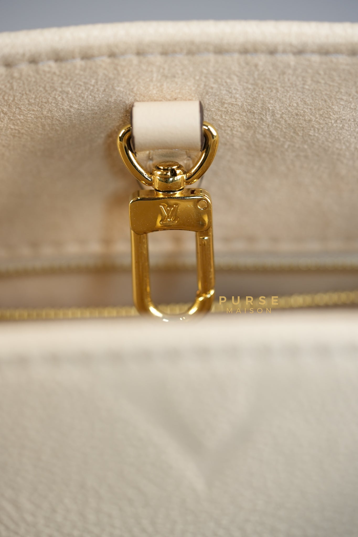 OnTheGo (OTG) PM Crème Empreinte Monogram (Microchip) | Purse Maison Luxury Bags Shop