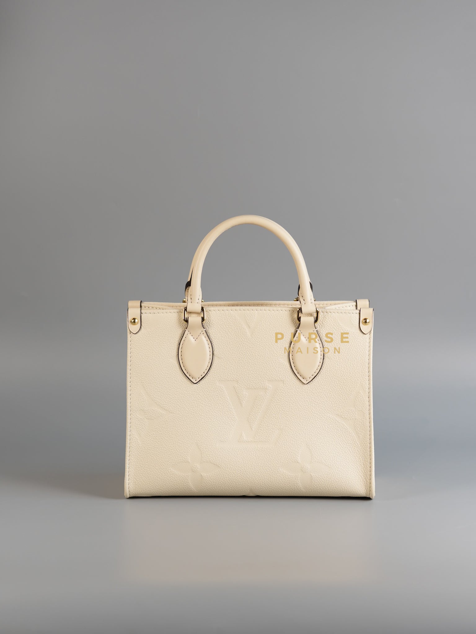 OnTheGo (OTG) PM Crème Empreinte Monogram (Microchip) | Purse Maison Luxury Bags Shop