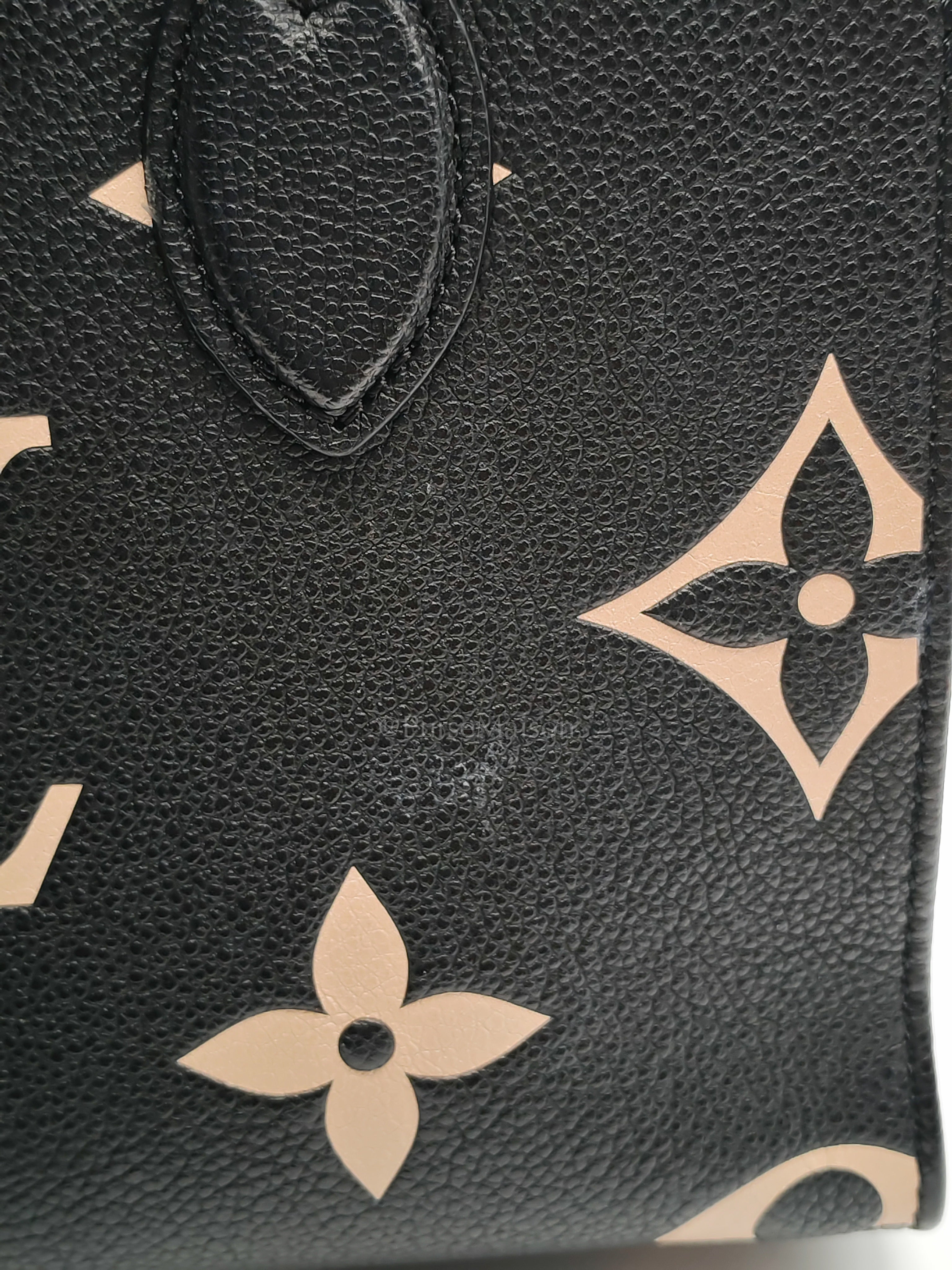 OnTheGo (OTG) PM in Bicolor Black/Creme Monogram Giant Empreinte & Gold Hardware Microchip | Purse Maison Luxury Bags Shop
