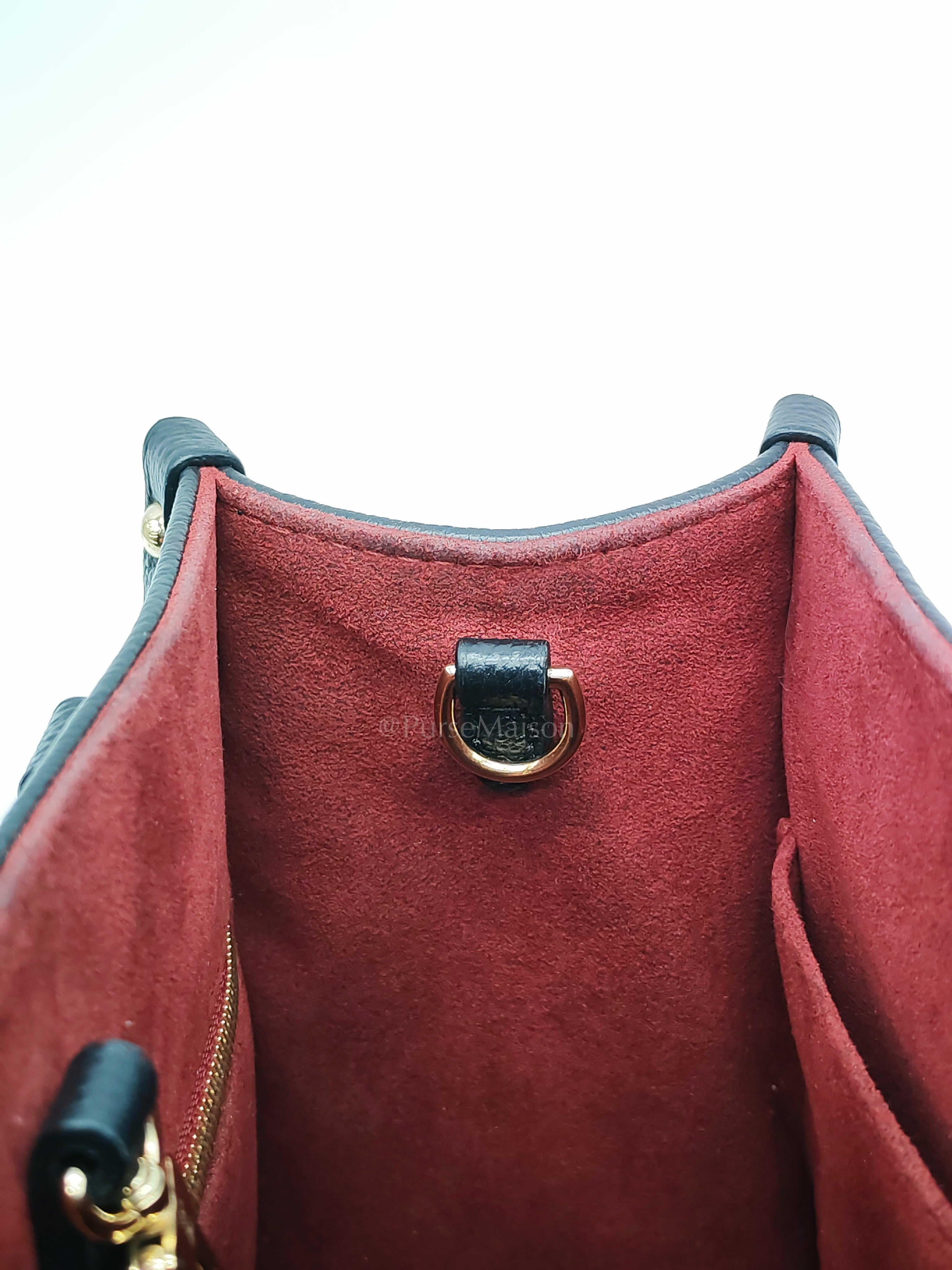 OnTheGo (OTG) PM in Bicolor Black/Creme Monogram Giant Empreinte & Gold Hardware Microchip | Purse Maison Luxury Bags Shop