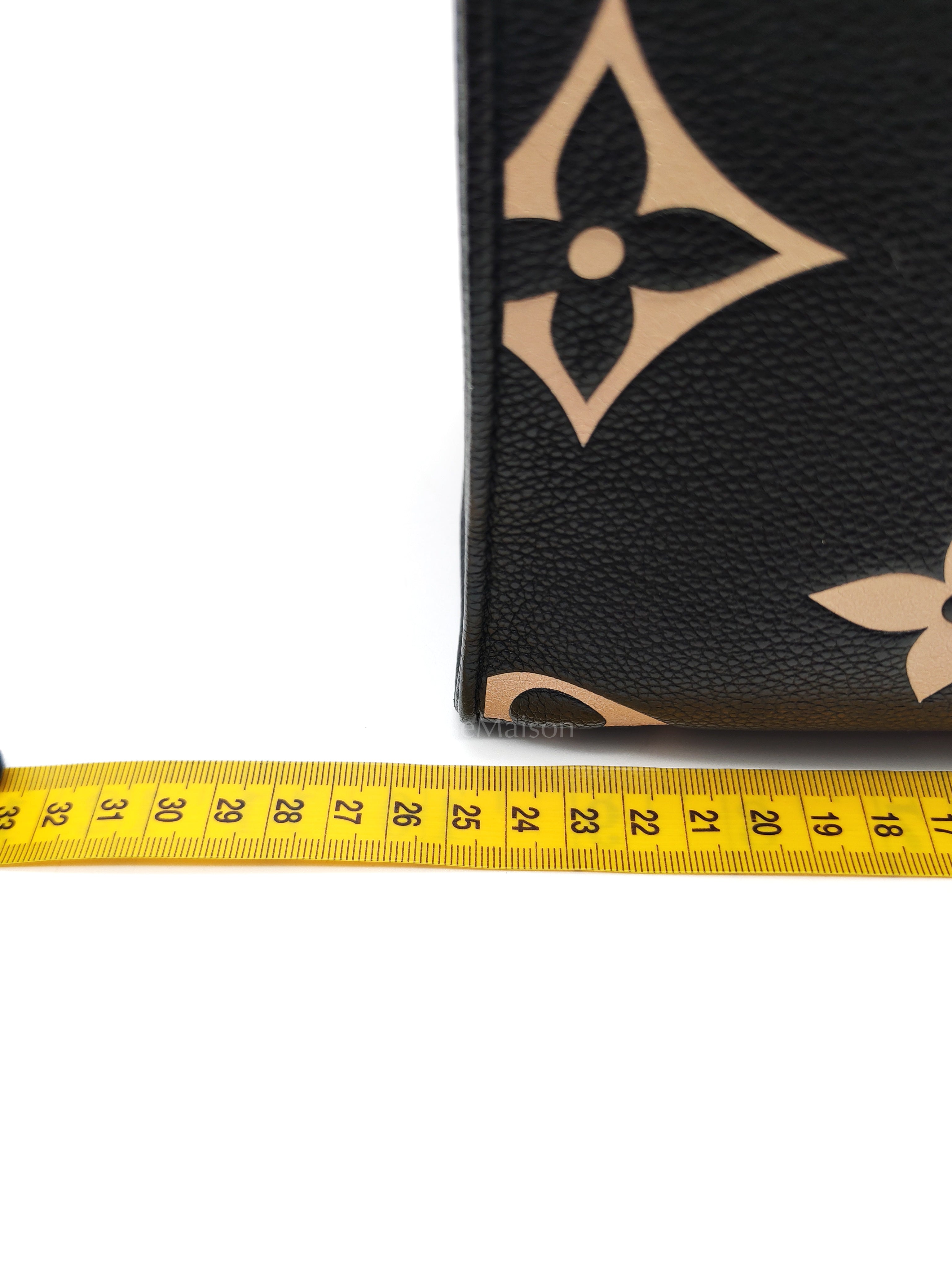 OnTheGo (OTG) PM in Bicolor Black/Creme Monogram Giant Empreinte & Gold Hardware Microchip | Purse Maison Luxury Bags Shop