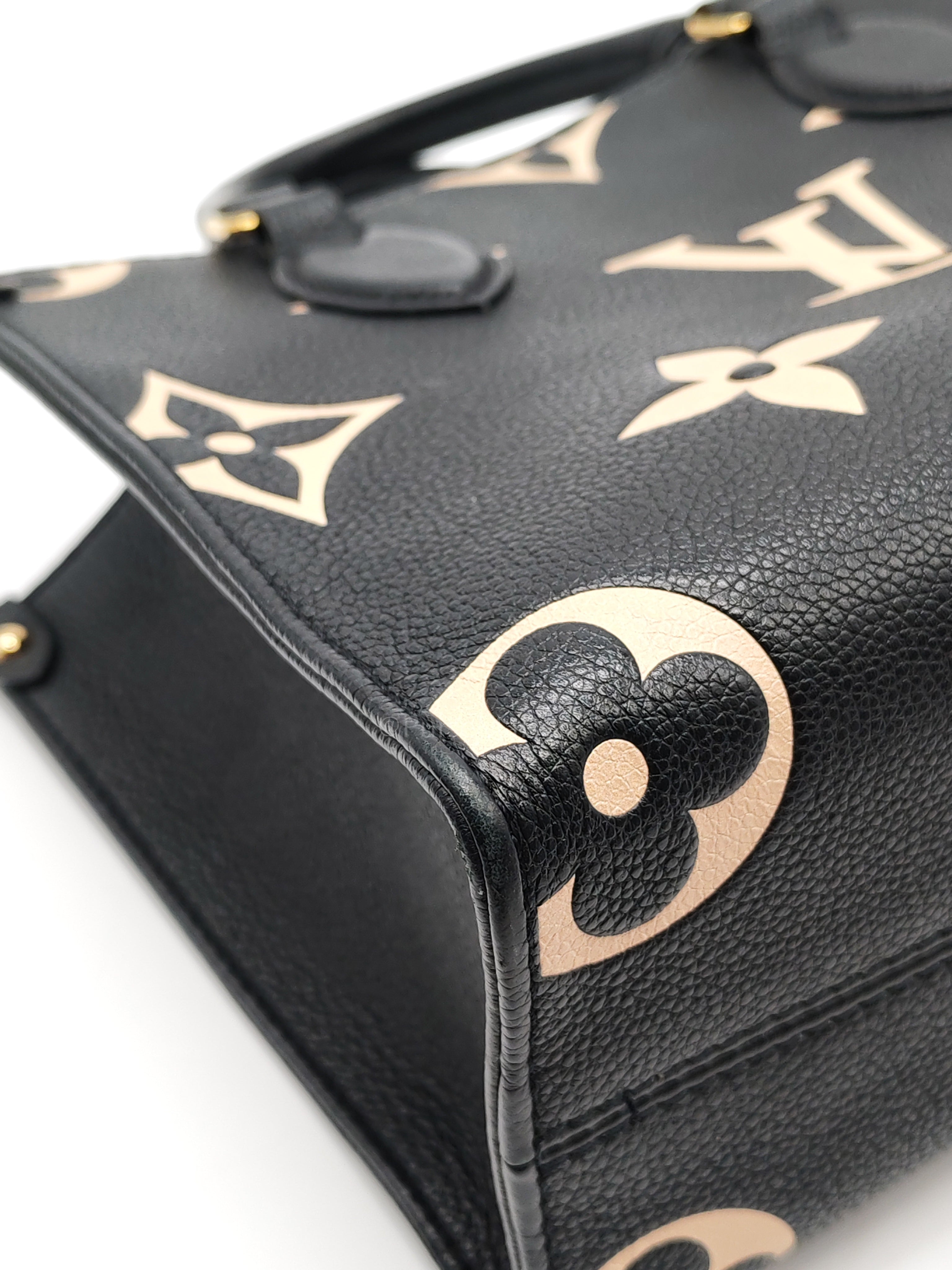 OnTheGo (OTG) PM in Bicolor Black/Creme Monogram Giant Empreinte & Gold Hardware Microchip | Purse Maison Luxury Bags Shop