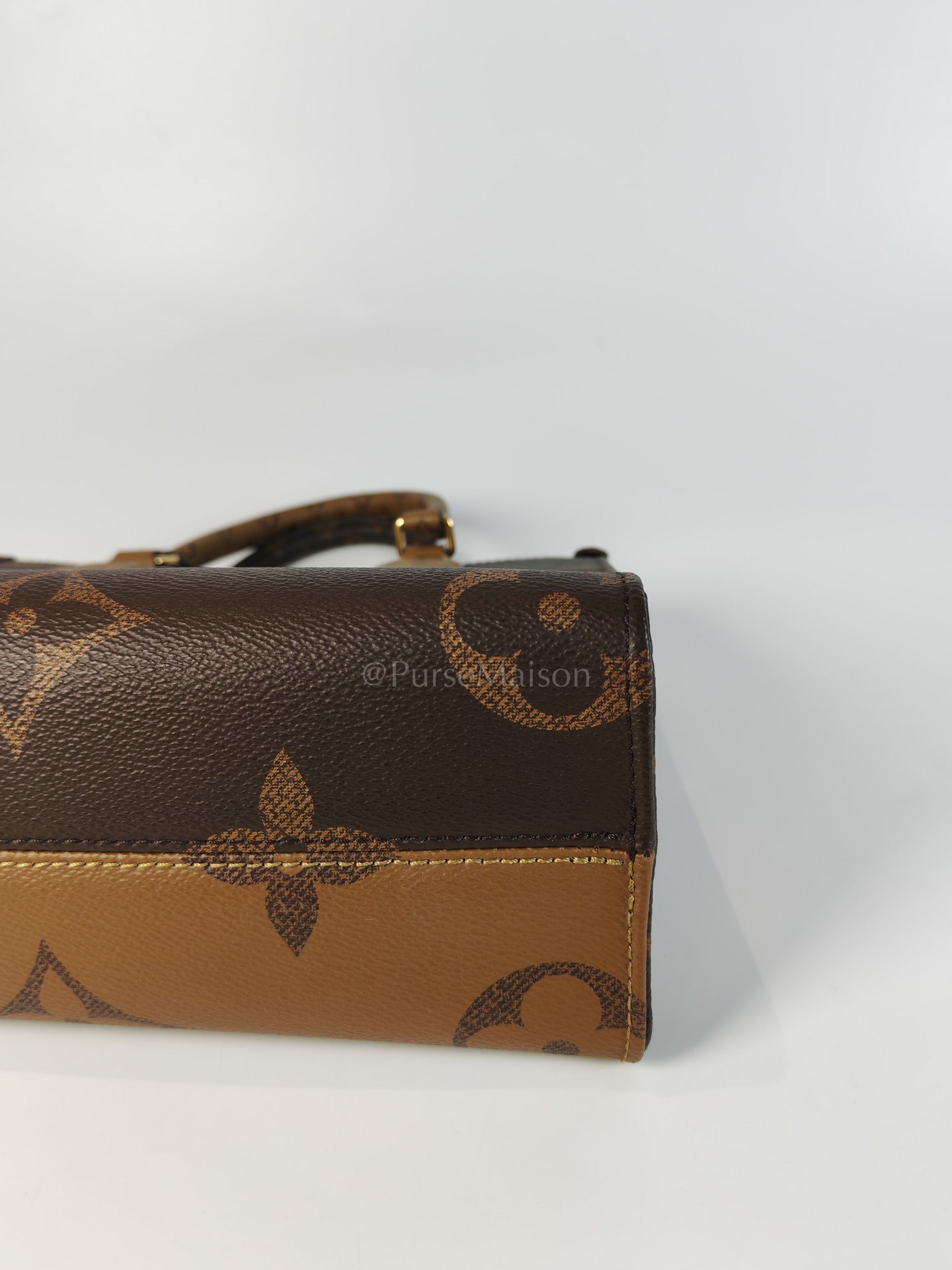 OnTheGo PM (OTG) in Reverse Monogram Canvas (Microchip) | Purse Maison Luxury Bags Shop