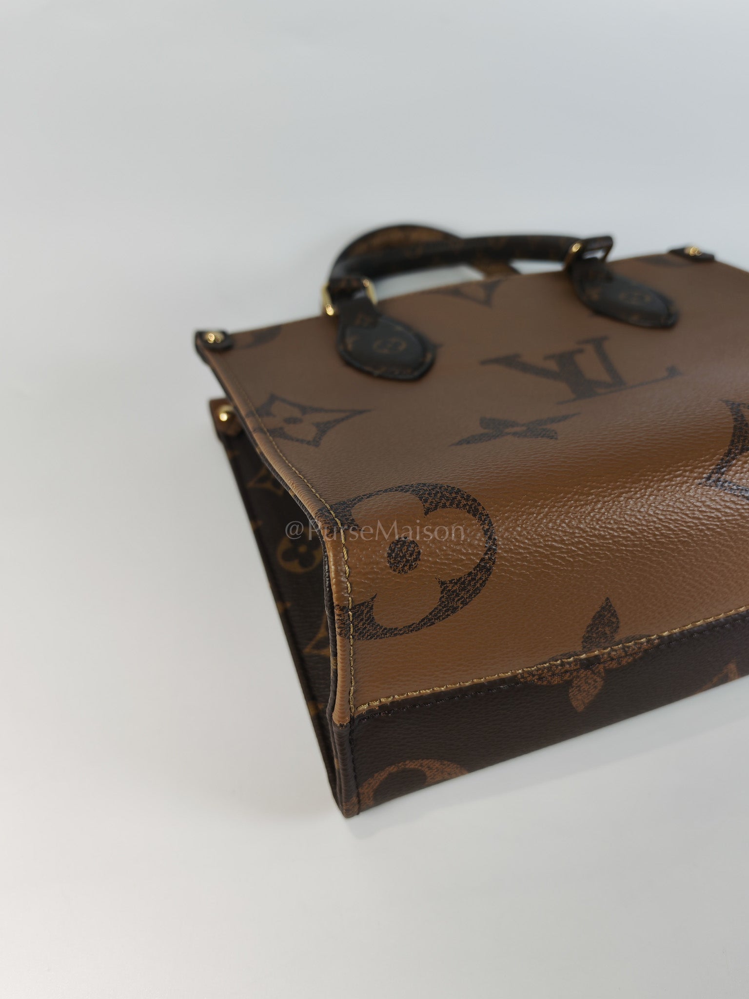 OnTheGo PM (OTG) in Reverse Monogram Canvas (Microchip) | Purse Maison Luxury Bags Shop