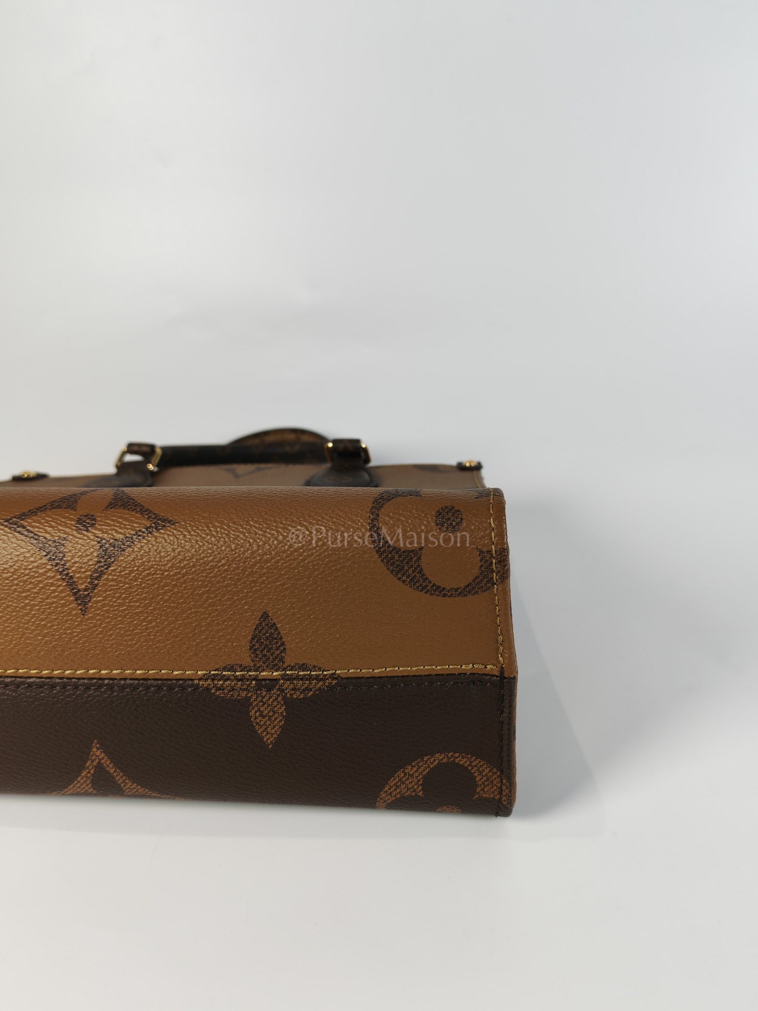 OnTheGo PM (OTG) in Reverse Monogram Canvas (Microchip) | Purse Maison Luxury Bags Shop