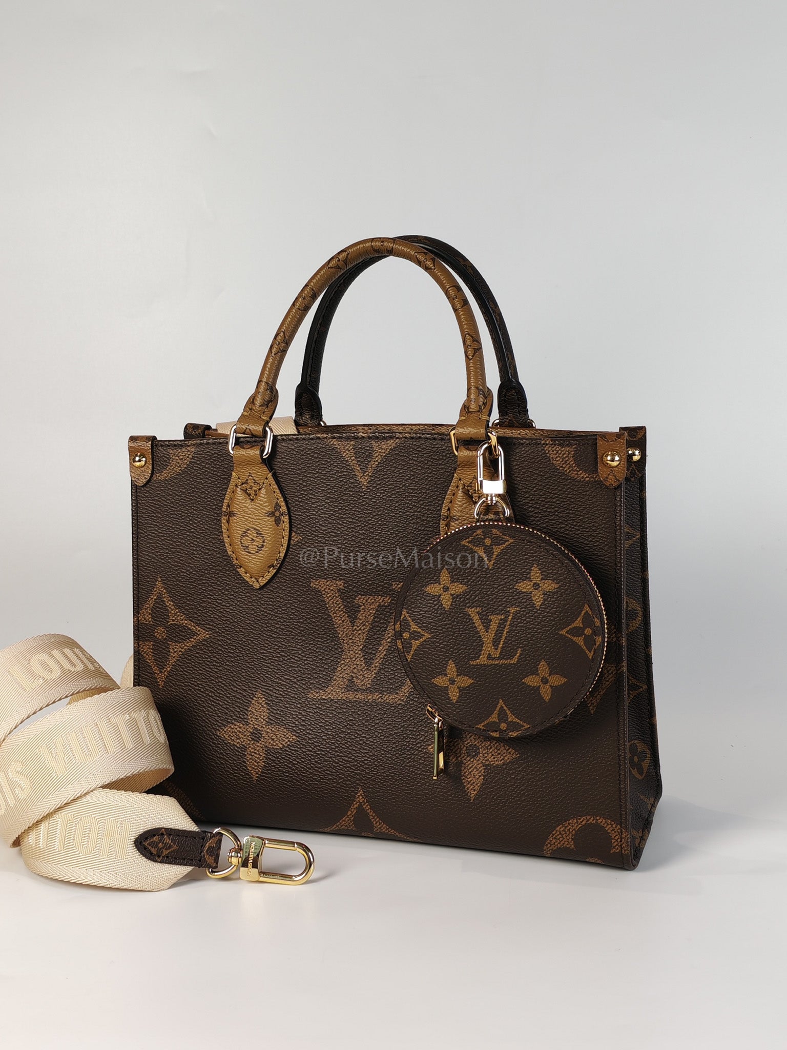 OnTheGo PM (OTG) in Reverse Monogram Canvas (Microchip) | Purse Maison Luxury Bags Shop