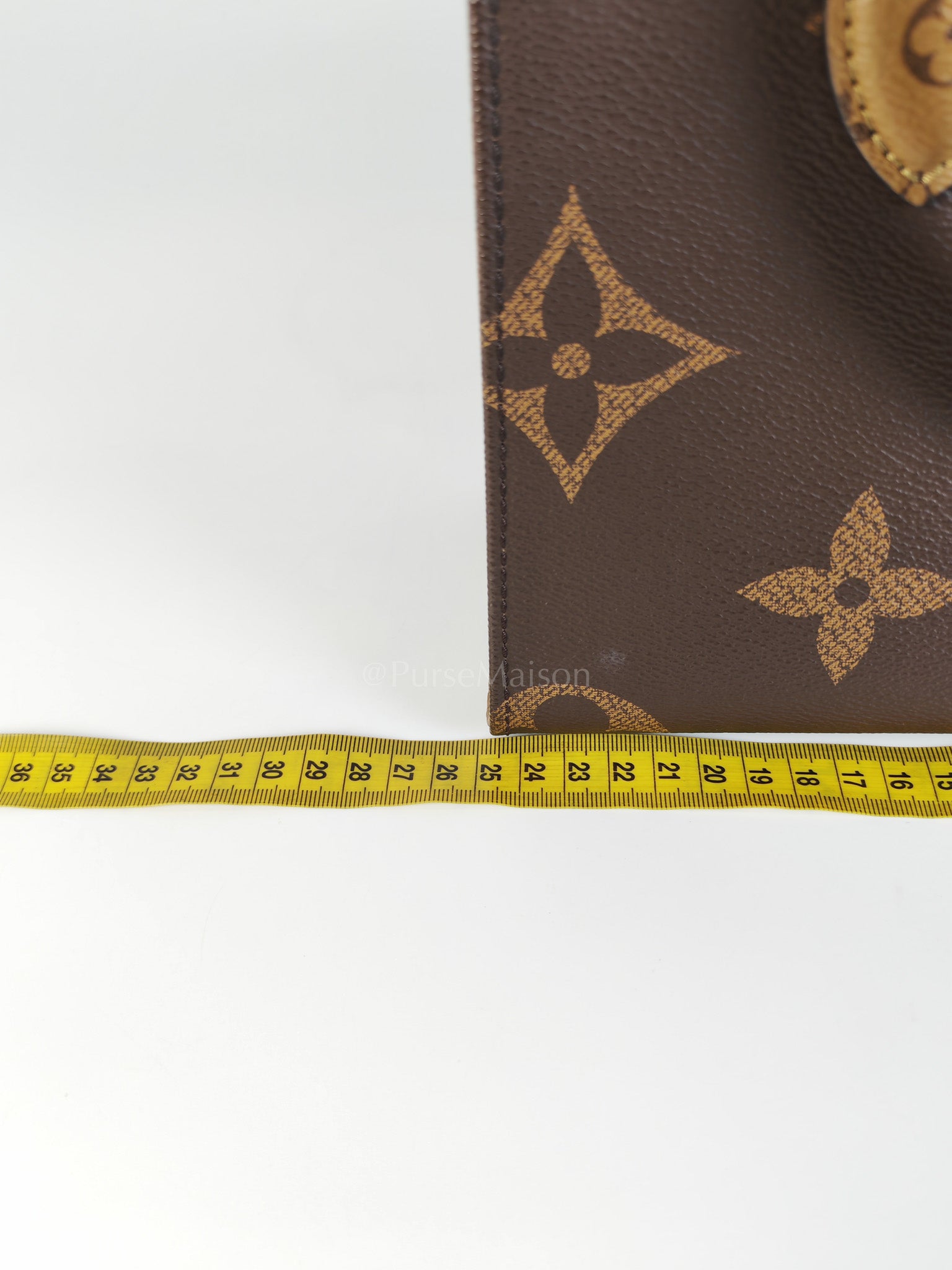 OnTheGo PM (OTG) in Reverse Monogram Canvas (Microchip) | Purse Maison Luxury Bags Shop