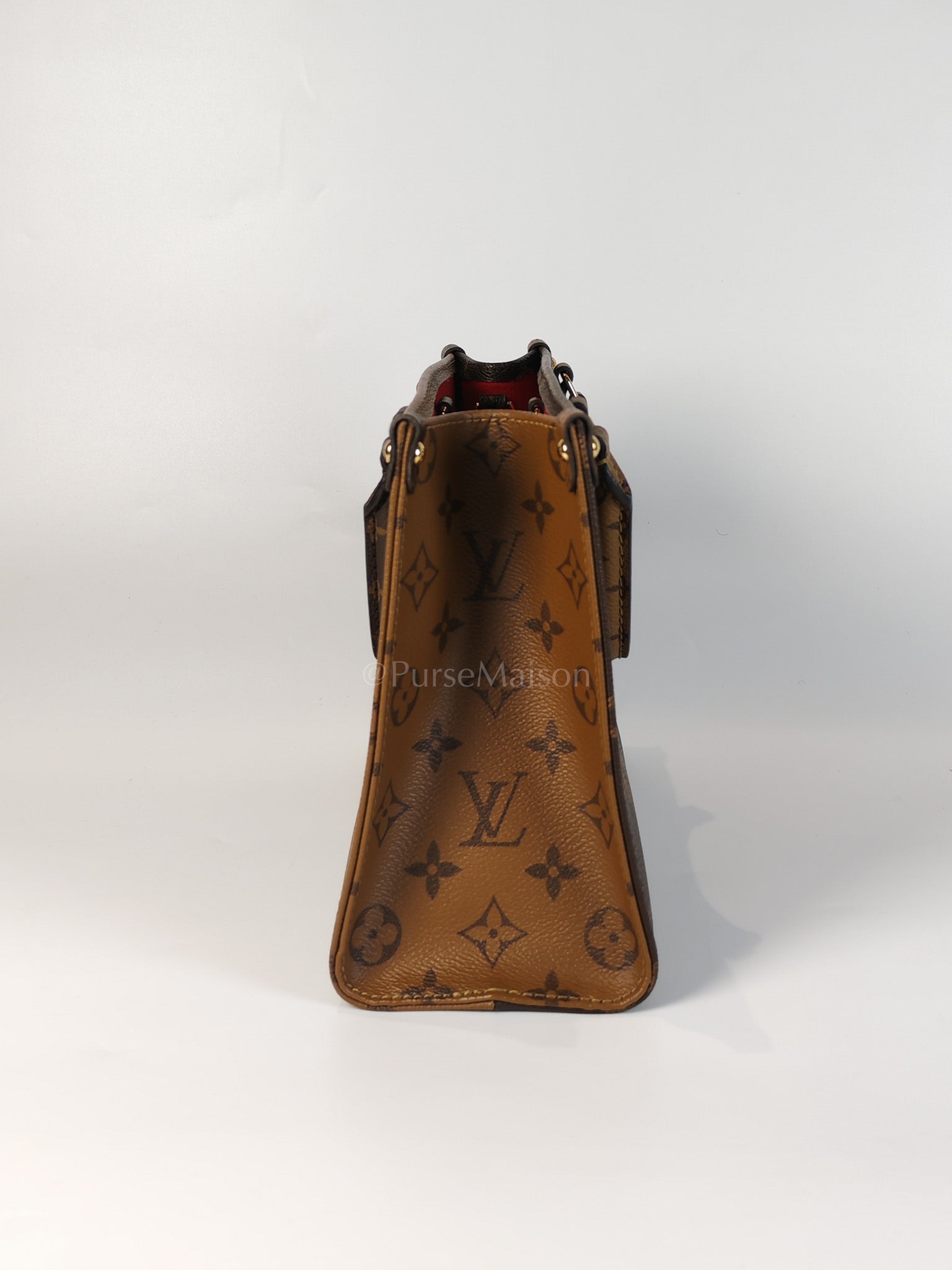 OnTheGo PM (OTG) in Reverse Monogram Canvas (Microchip) | Purse Maison Luxury Bags Shop