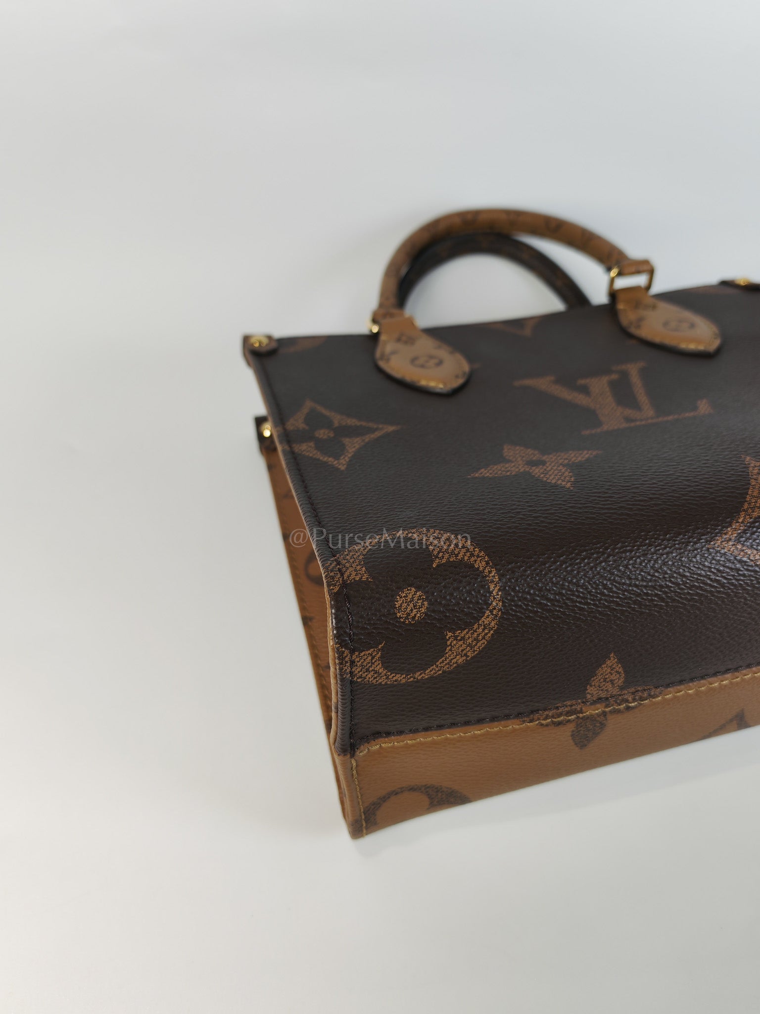 OnTheGo PM (OTG) in Reverse Monogram Canvas (Microchip) | Purse Maison Luxury Bags Shop