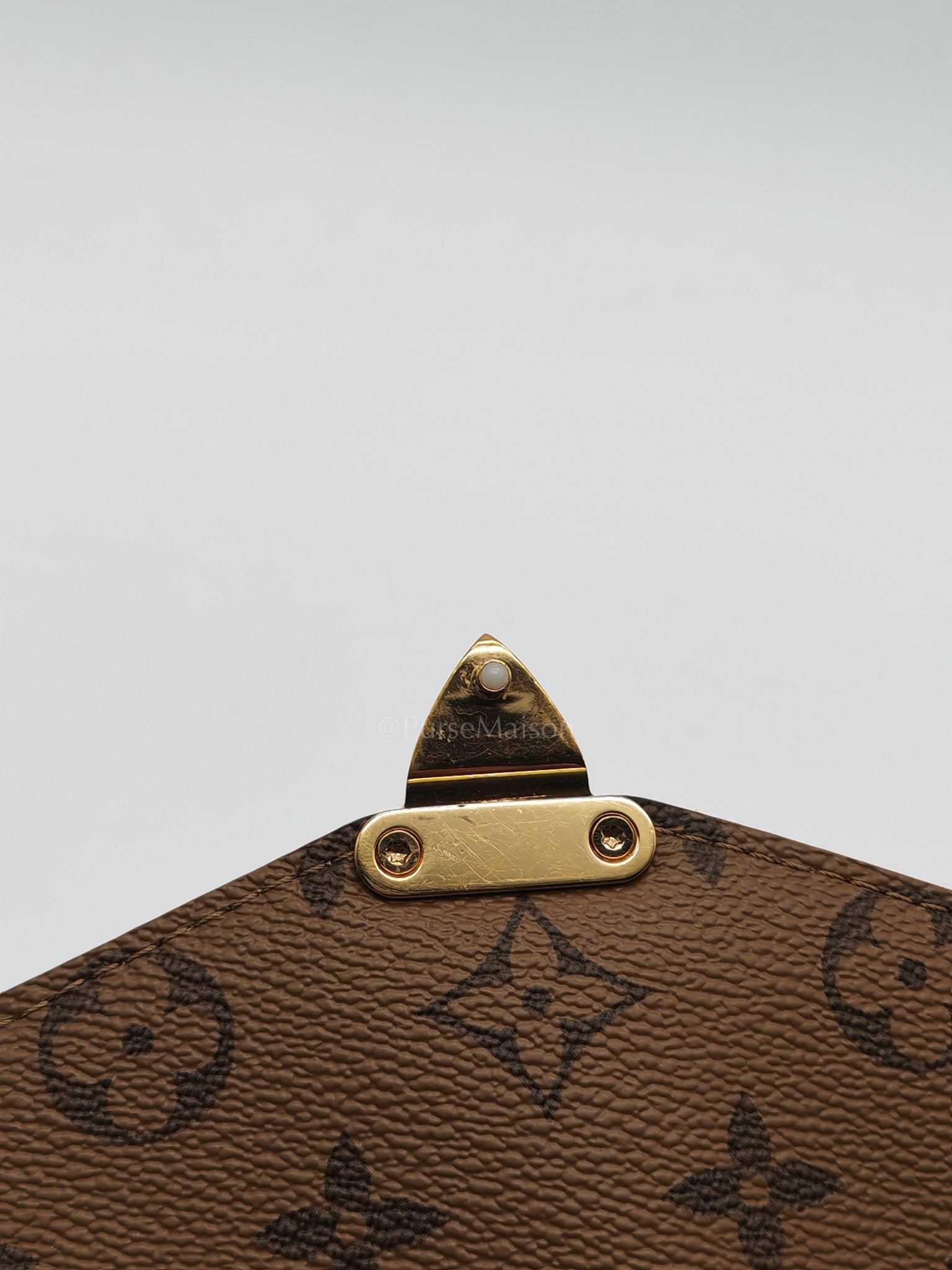 Pochette Metis in Reverse Monogram Canvas & Gold Hardware Microchip | Purse Maison Luxury Bags Shop