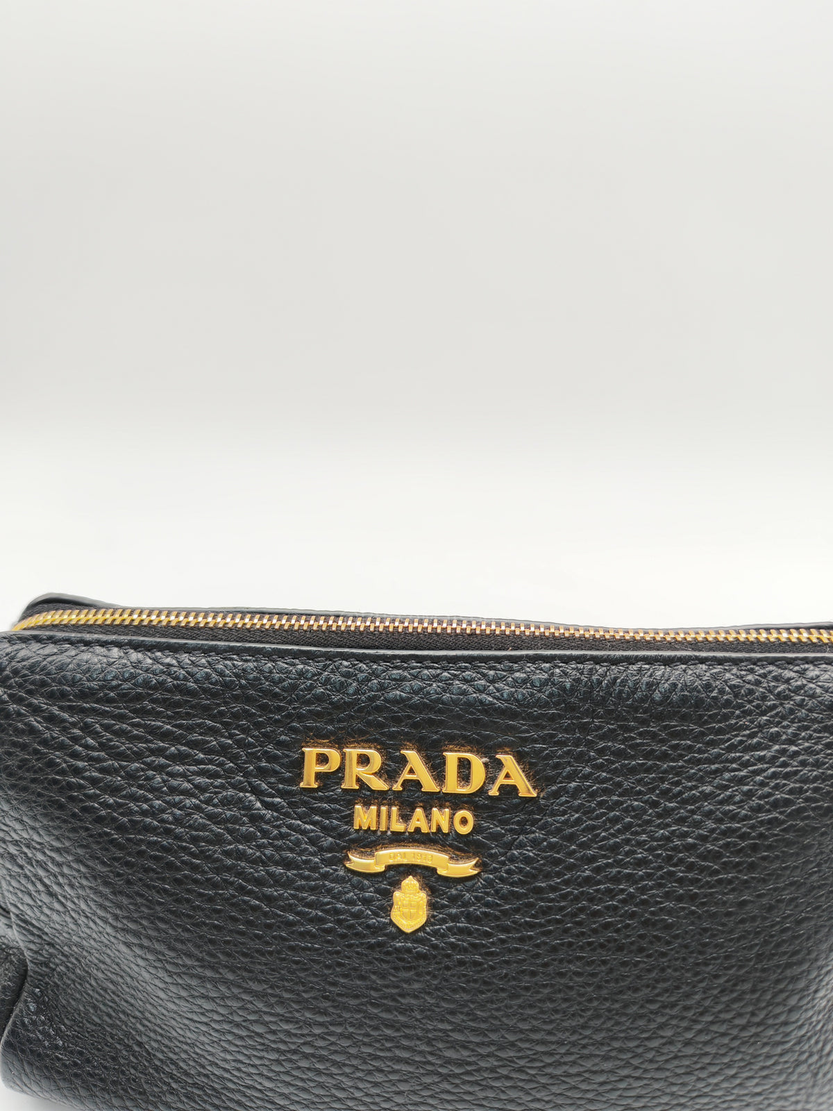 Prada 1ND004 Vitello Daino Cosmetic Pouch in Black Grained Leather and Gold Hardware | Purse Maison Luxury Bags Shop