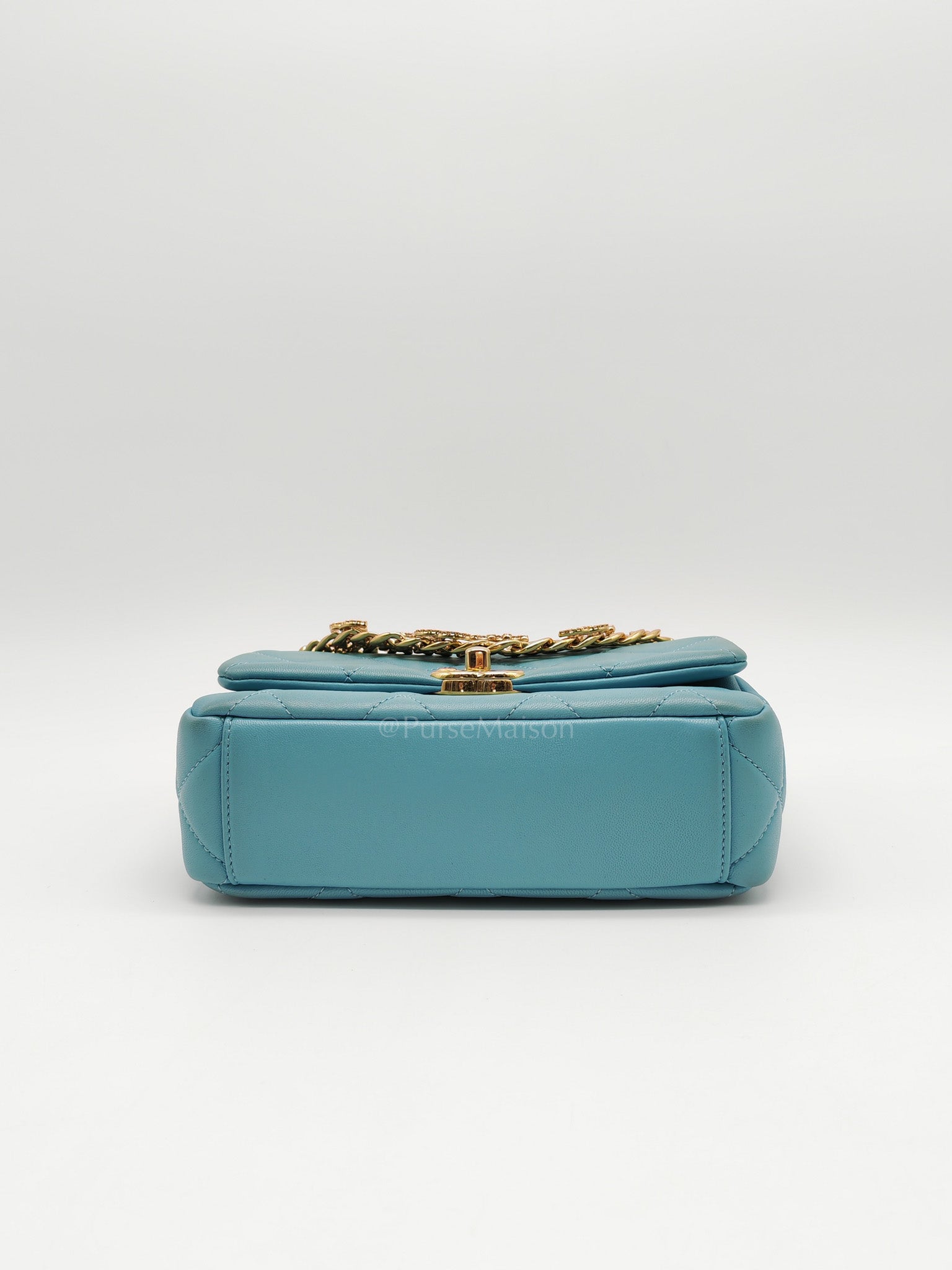 Mini CC Crystal Logo Chain Flap Bag in Light Blue Quilted Lambskin Leather & Gold Hardware Microchip