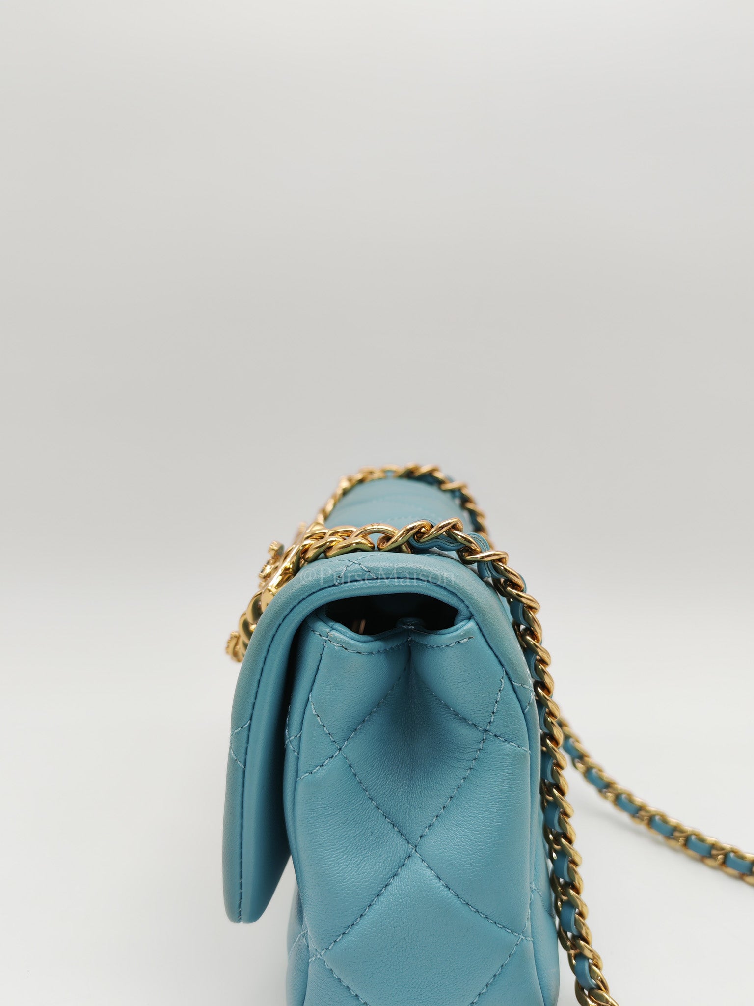 Mini CC Crystal Logo Chain Flap Bag in Light Blue Quilted Lambskin Leather & Gold Hardware Microchip
