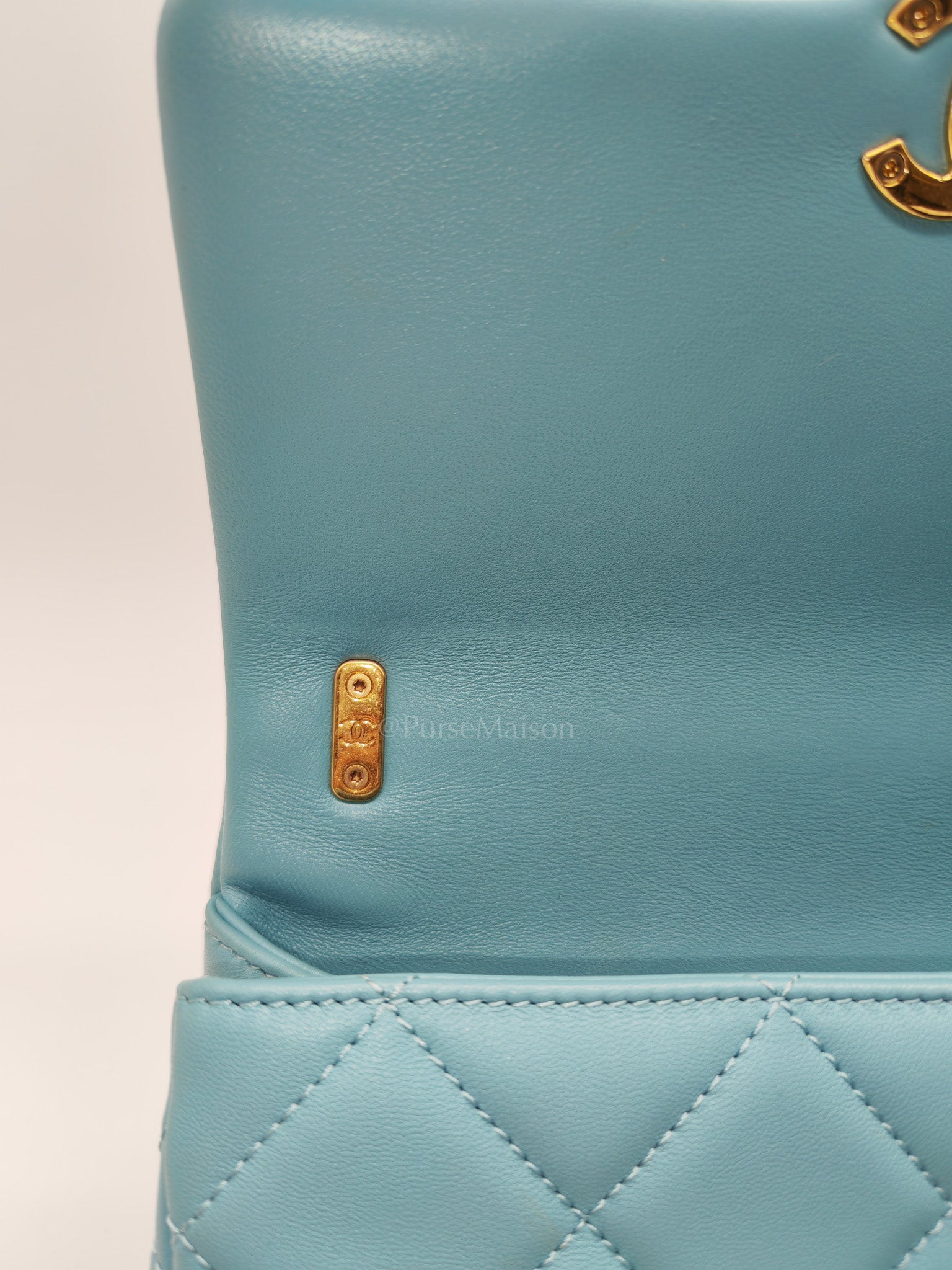 Mini CC Crystal Logo Chain Flap Bag in Light Blue Quilted Lambskin Leather & Gold Hardware Microchip