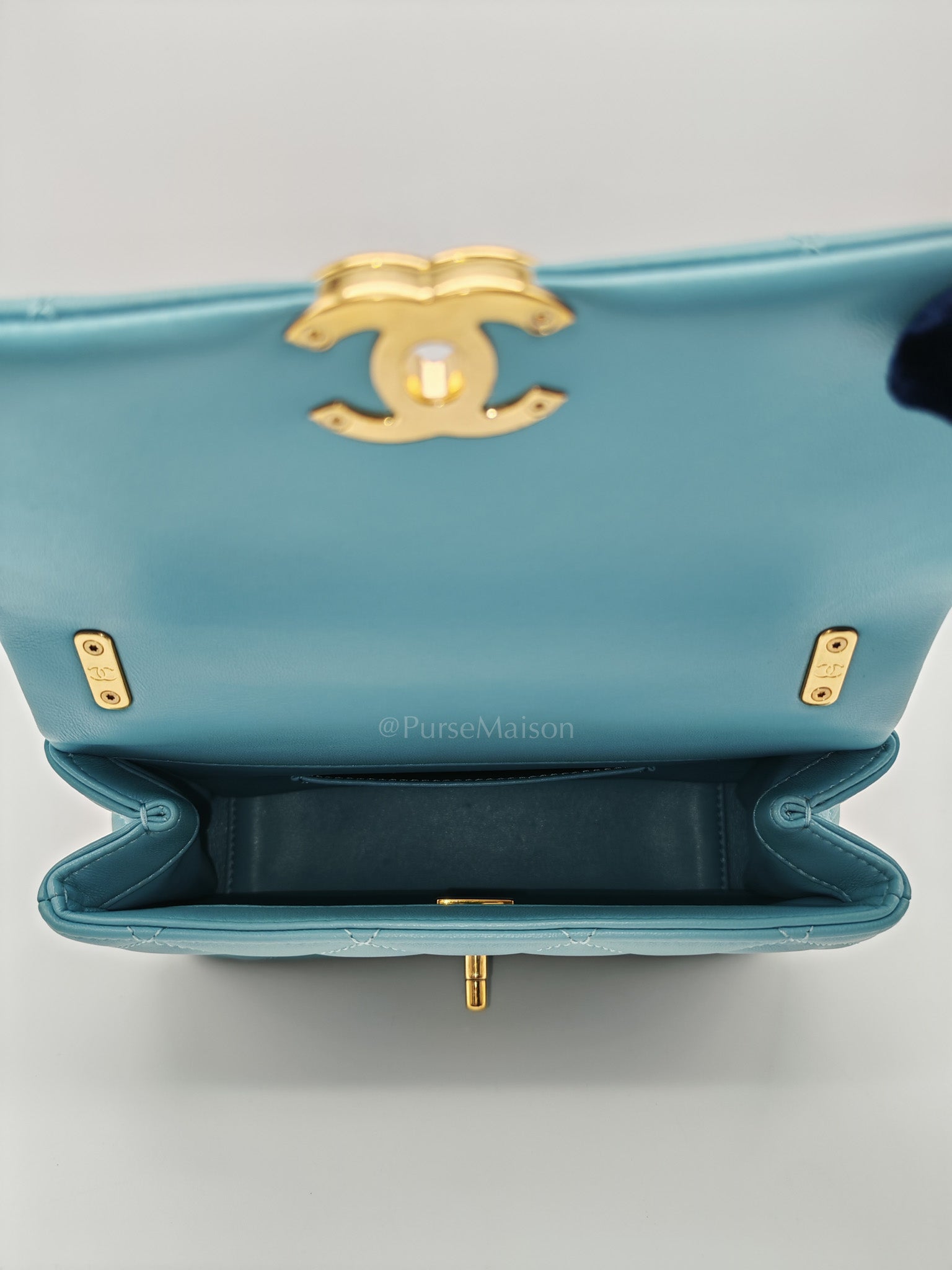Mini CC Crystal Logo Chain Flap Bag in Light Blue Quilted Lambskin Leather & Gold Hardware Microchip