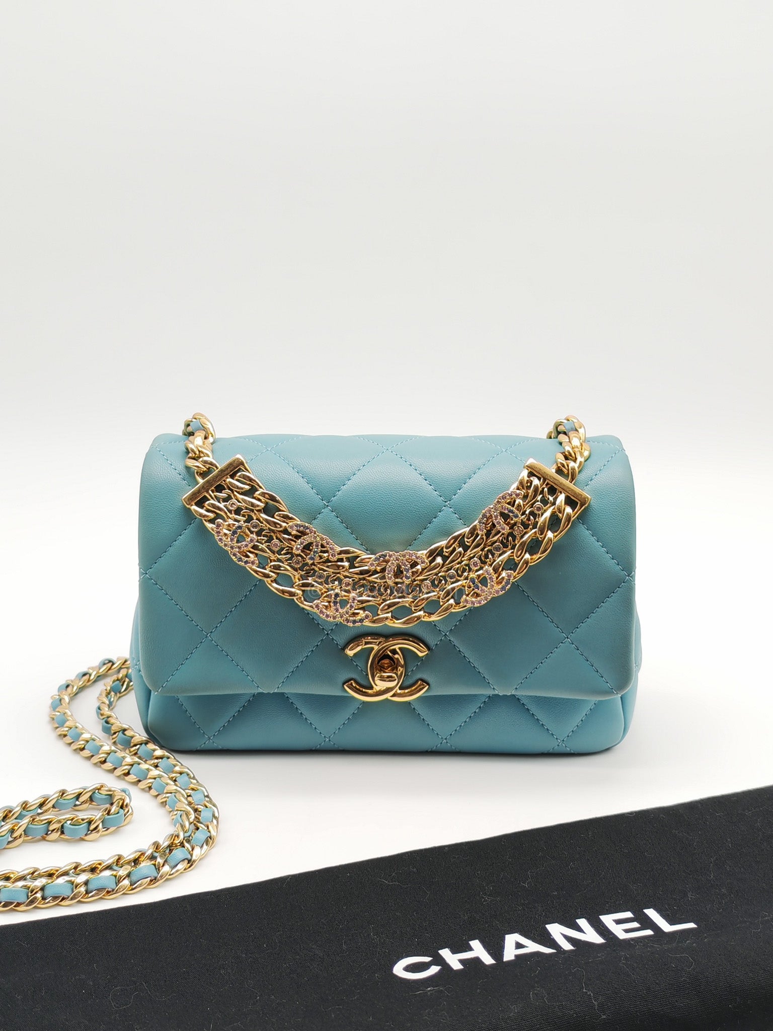 Mini CC Crystal Logo Chain Flap Bag in Light Blue Quilted Lambskin Leather & Gold Hardware Microchip