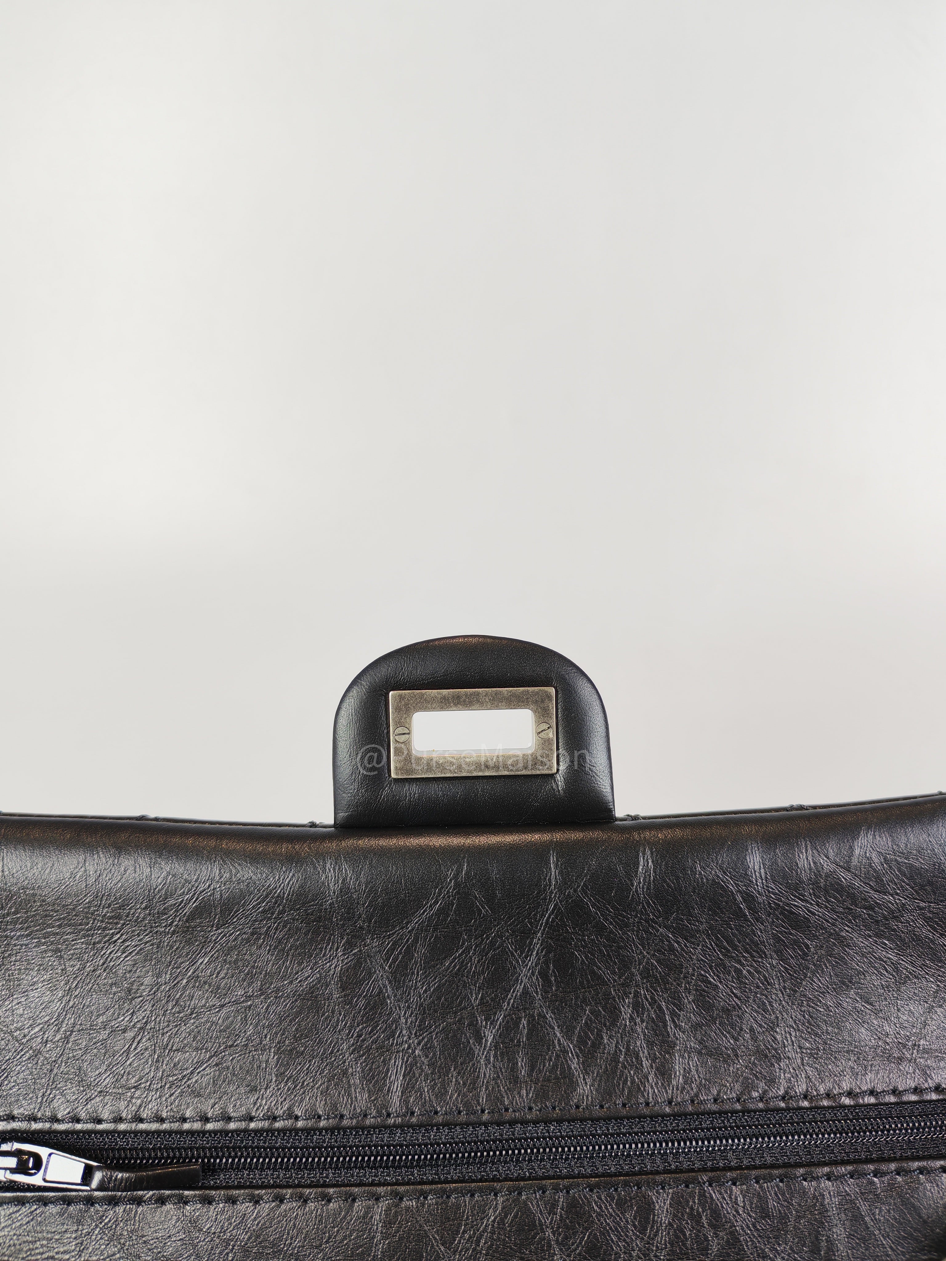 Reissue Small in Black Aged Calfskin Leather and Ruthenium Hardware (Microchip) | Purse Maison Luxury Bags Shop