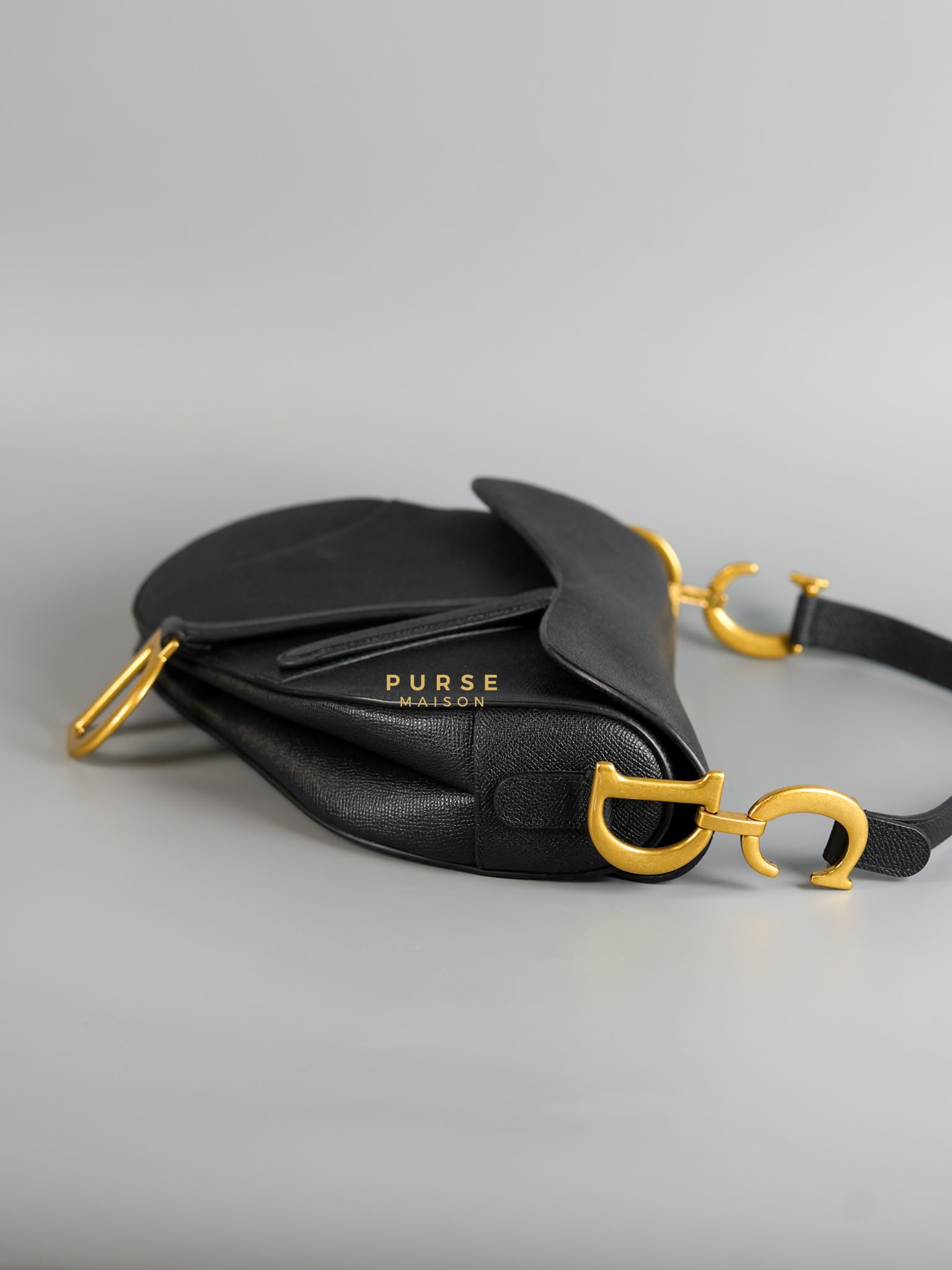 Saddle Medium in Black Grained Calfskin Leather and Gold Hardware | Purse Maison Luxury Bags Shop