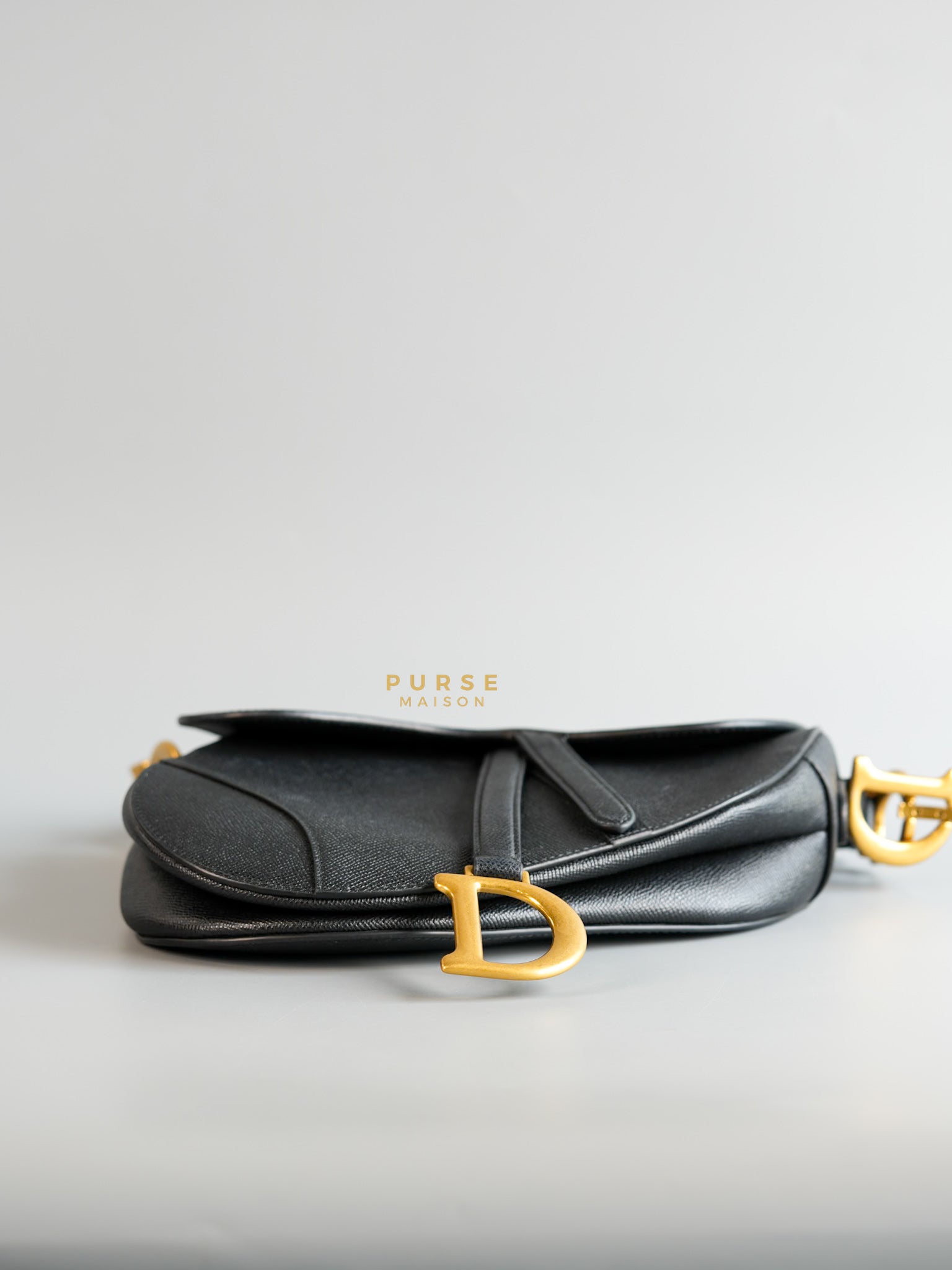 Saddle Medium in Black Grained Calfskin Leather and Gold Hardware | Purse Maison Luxury Bags Shop