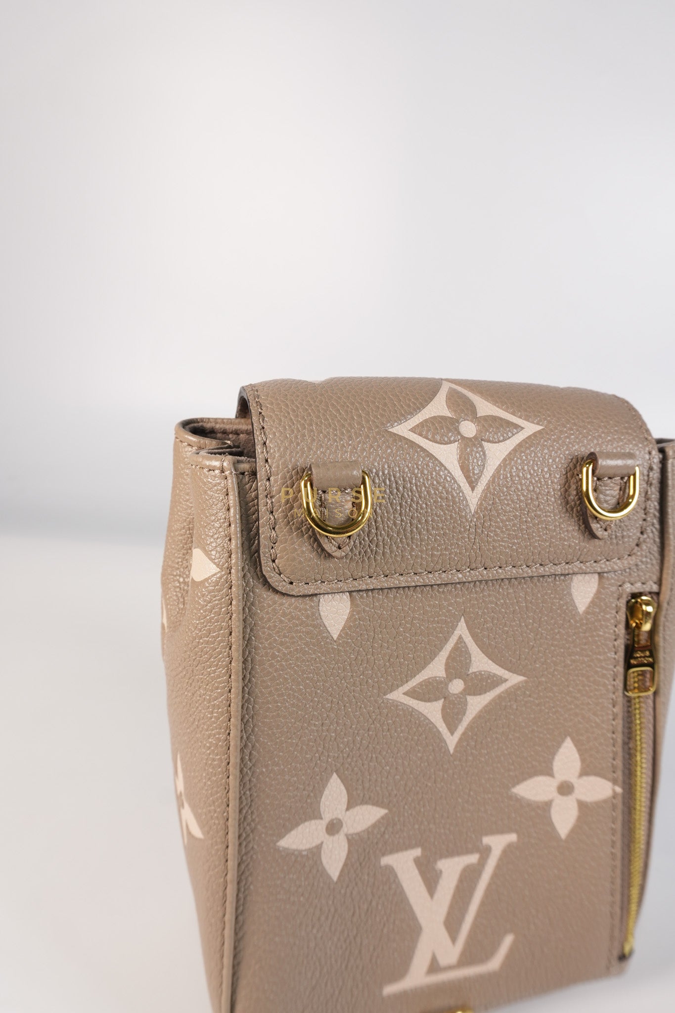 Tiny Backpack in Bicolor Monogram Empreinte Leather (Microchip) | Purse Maison Luxury Bags Shop