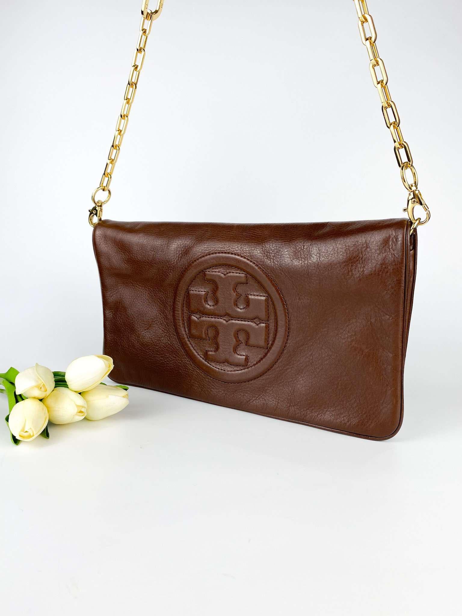 Tory burch gold purse hot sale