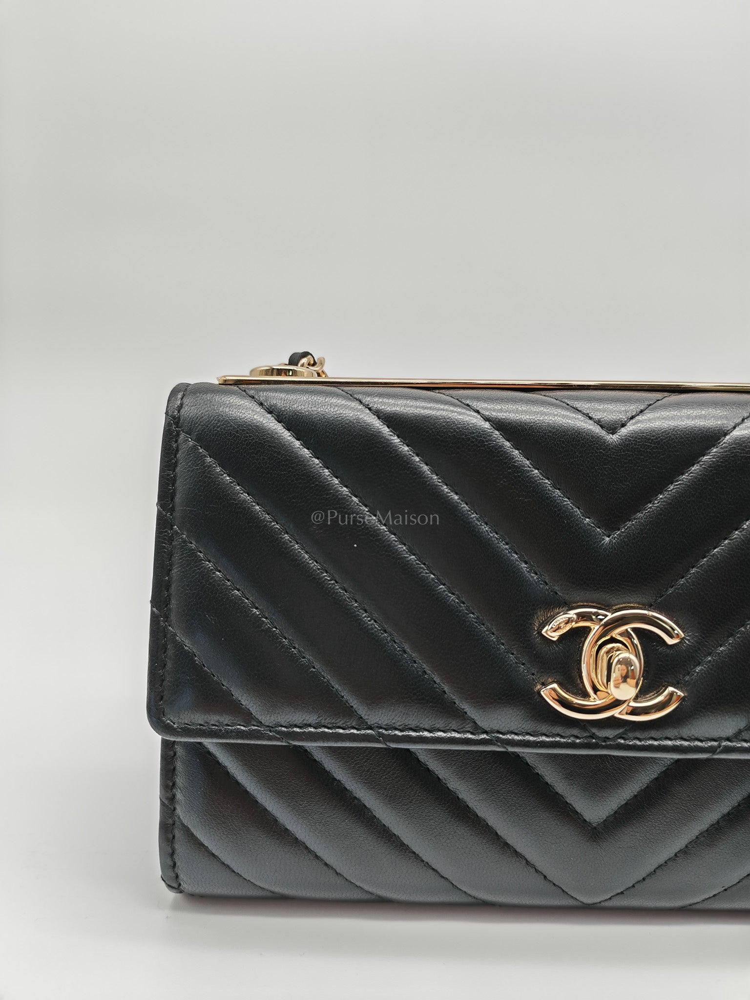 Trendy CC Wallet On Chain (WOC) in Black Chevron Lambskin Leather and Light Gold Hardware Series 25 | Purse Maison Luxury Bags Shop