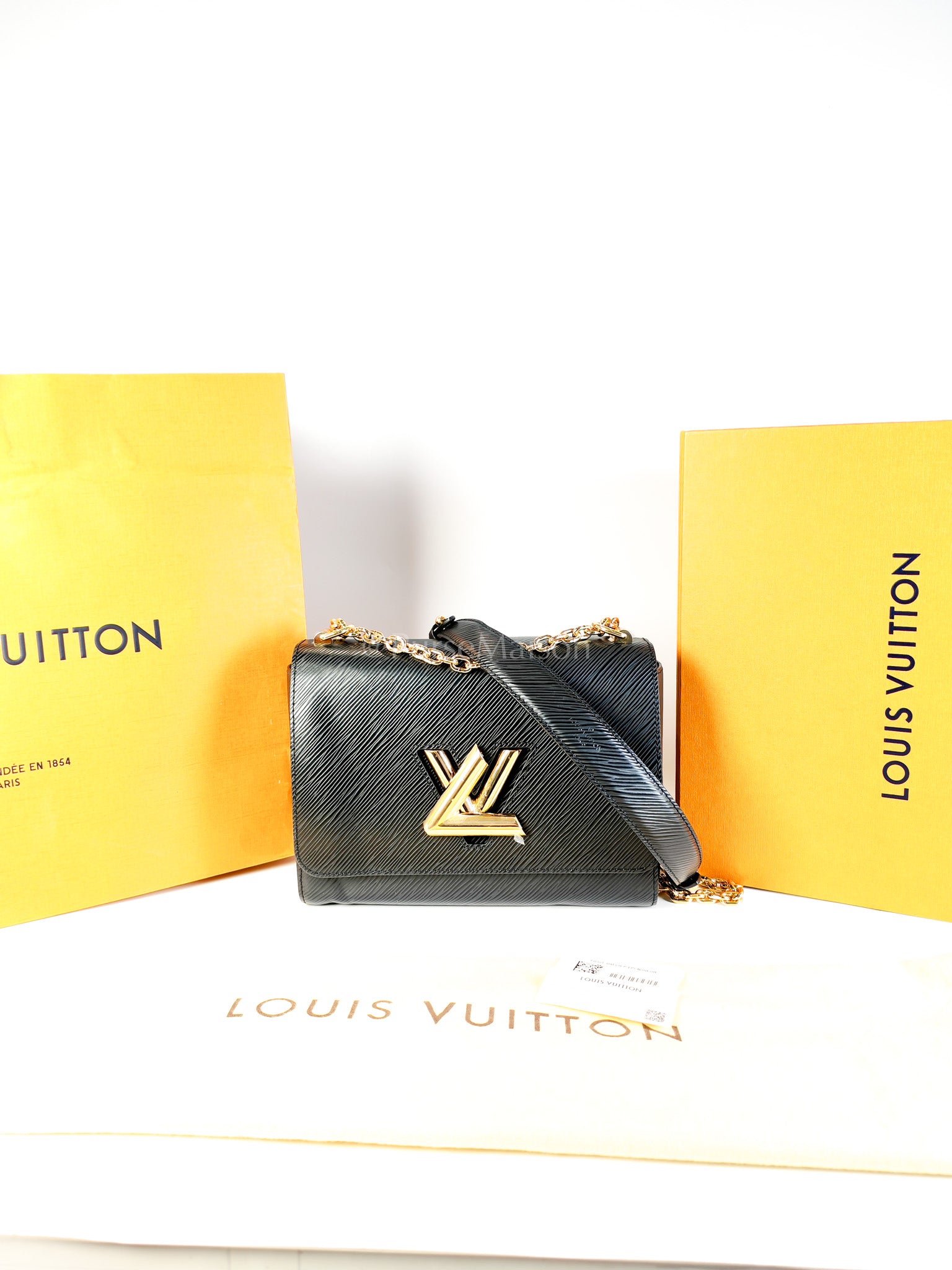 Twist Lock MM in Black Epi Leather Gold Hardware (Microchip) | Purse Maison Luxury Bags Shop