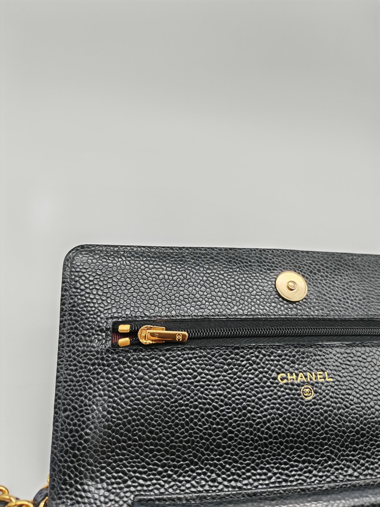 Wallet On Chain (WOC) in Black Quilted Caviar Leather and Gold Hardware Microchip