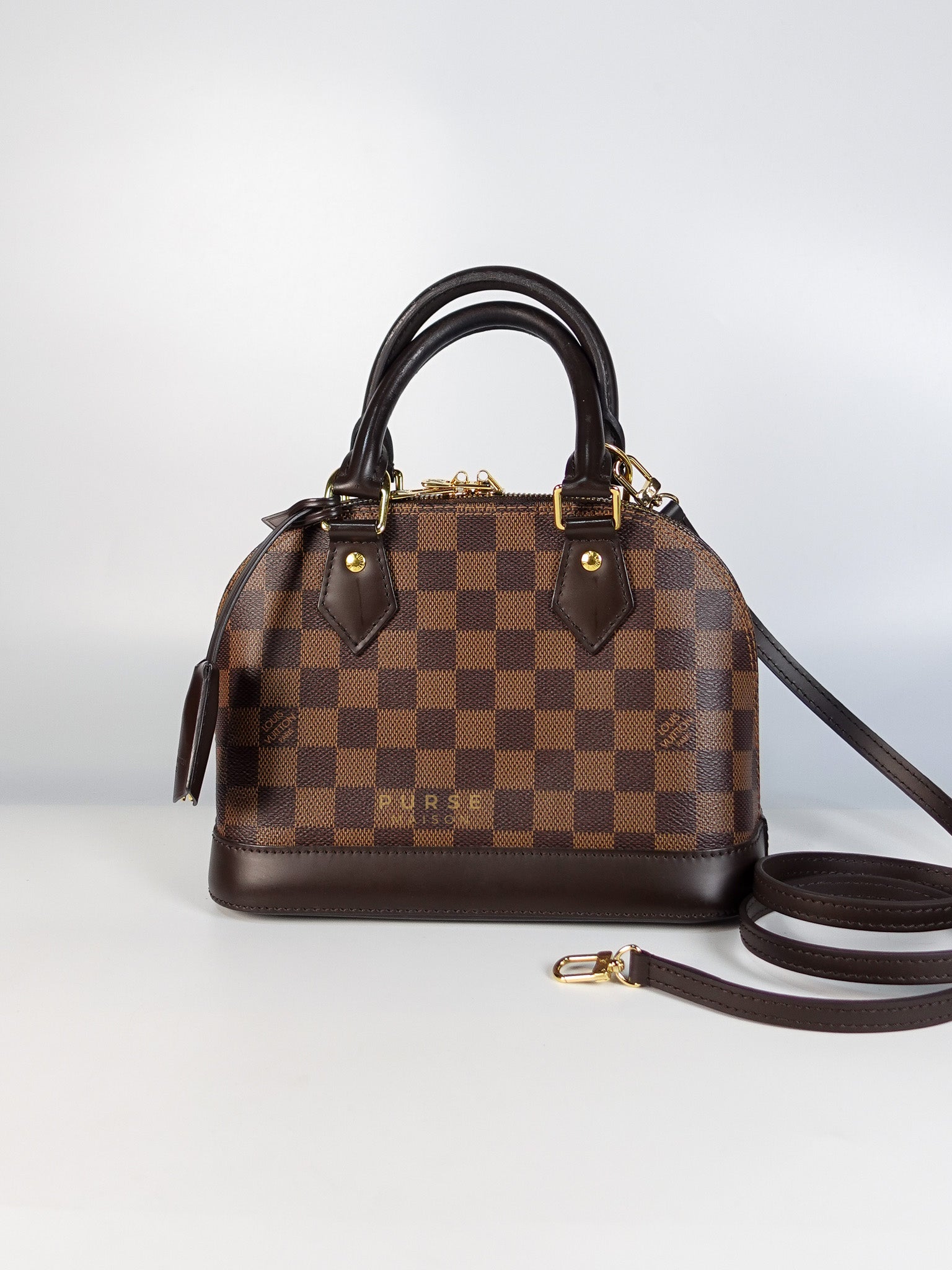 Alma BB in Damier Ebene Canvas (Microchip)