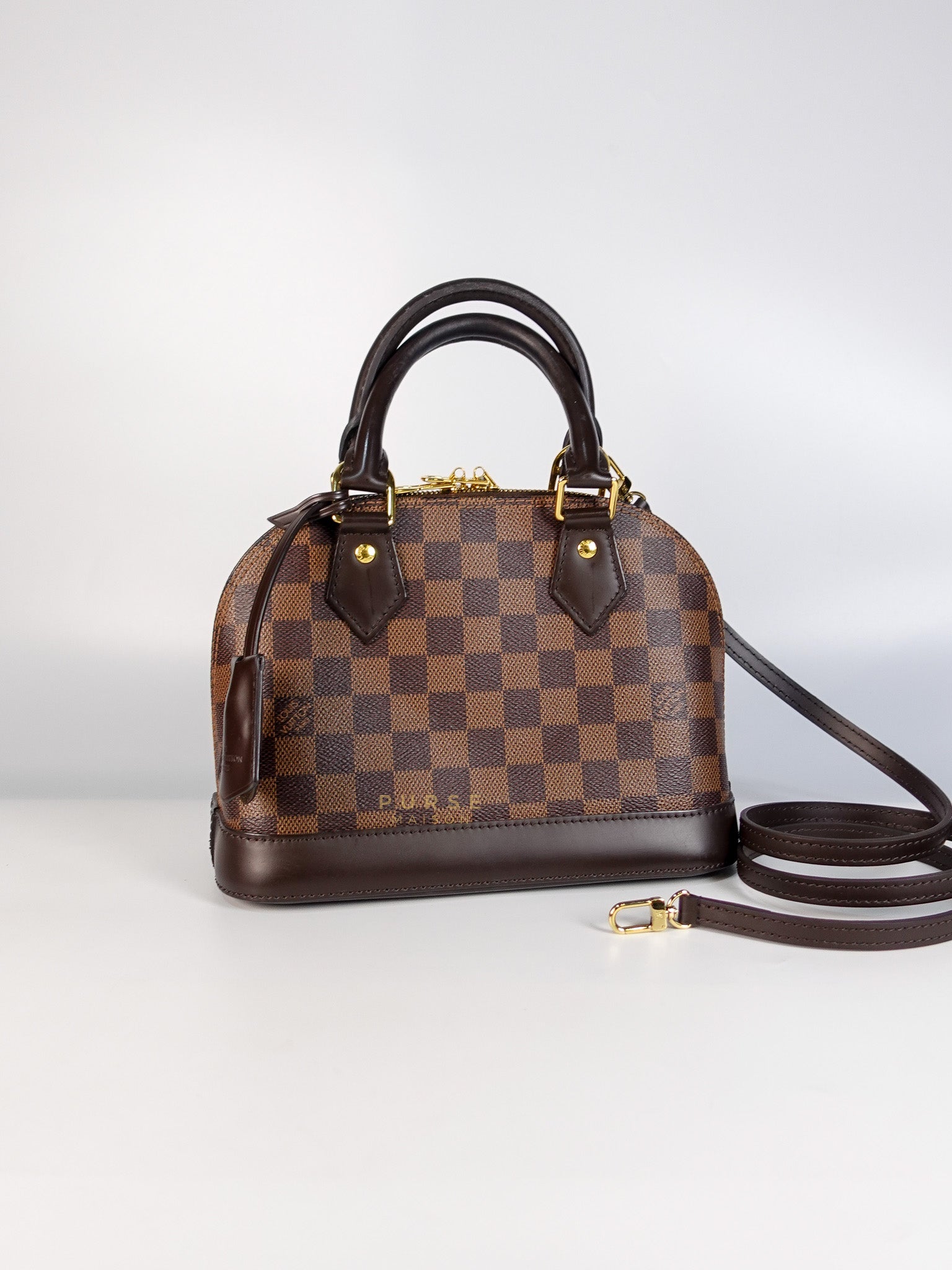Alma BB in Damier Ebene Canvas (Microchip)