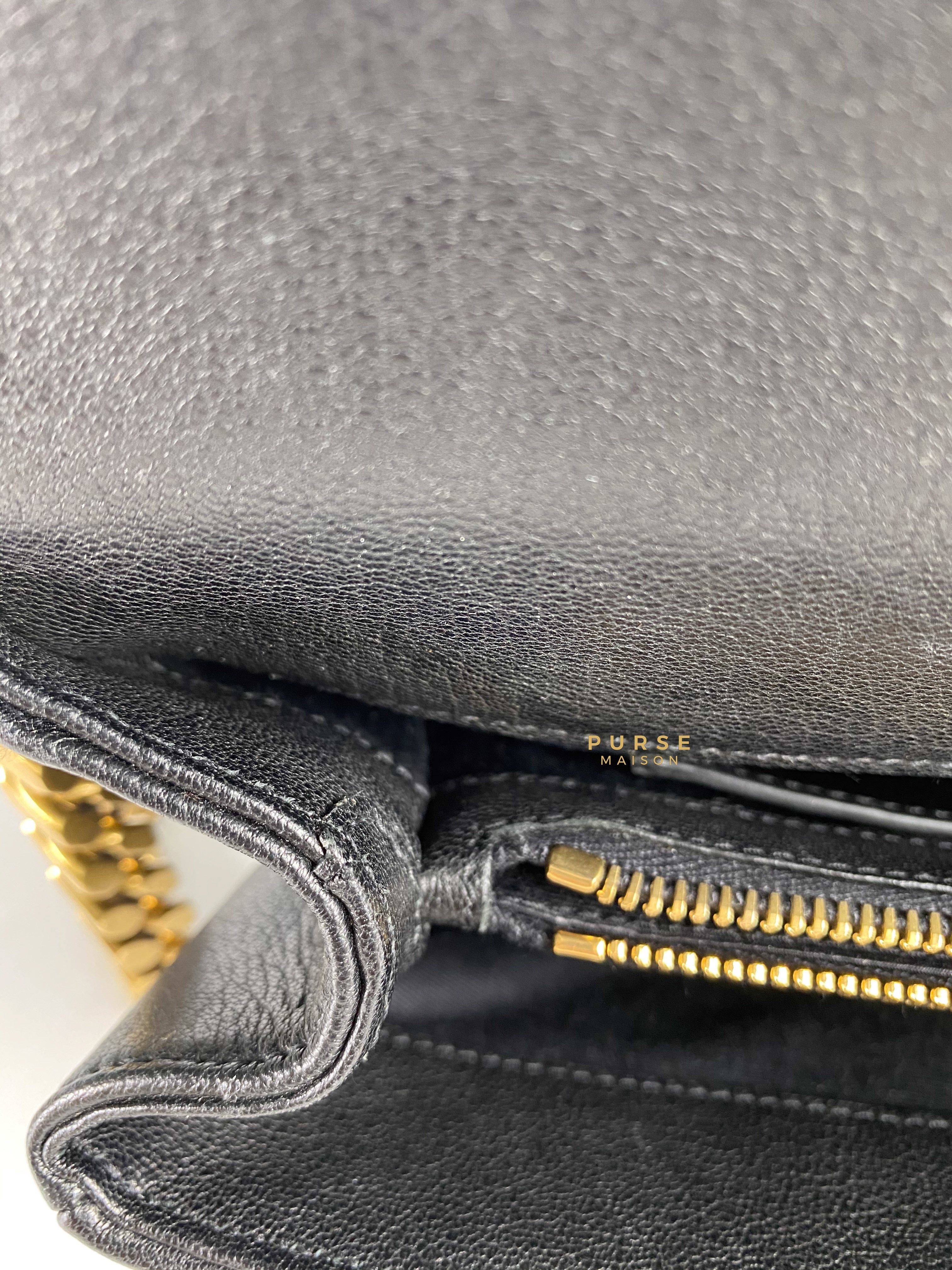 Ysl black and gold on sale purse