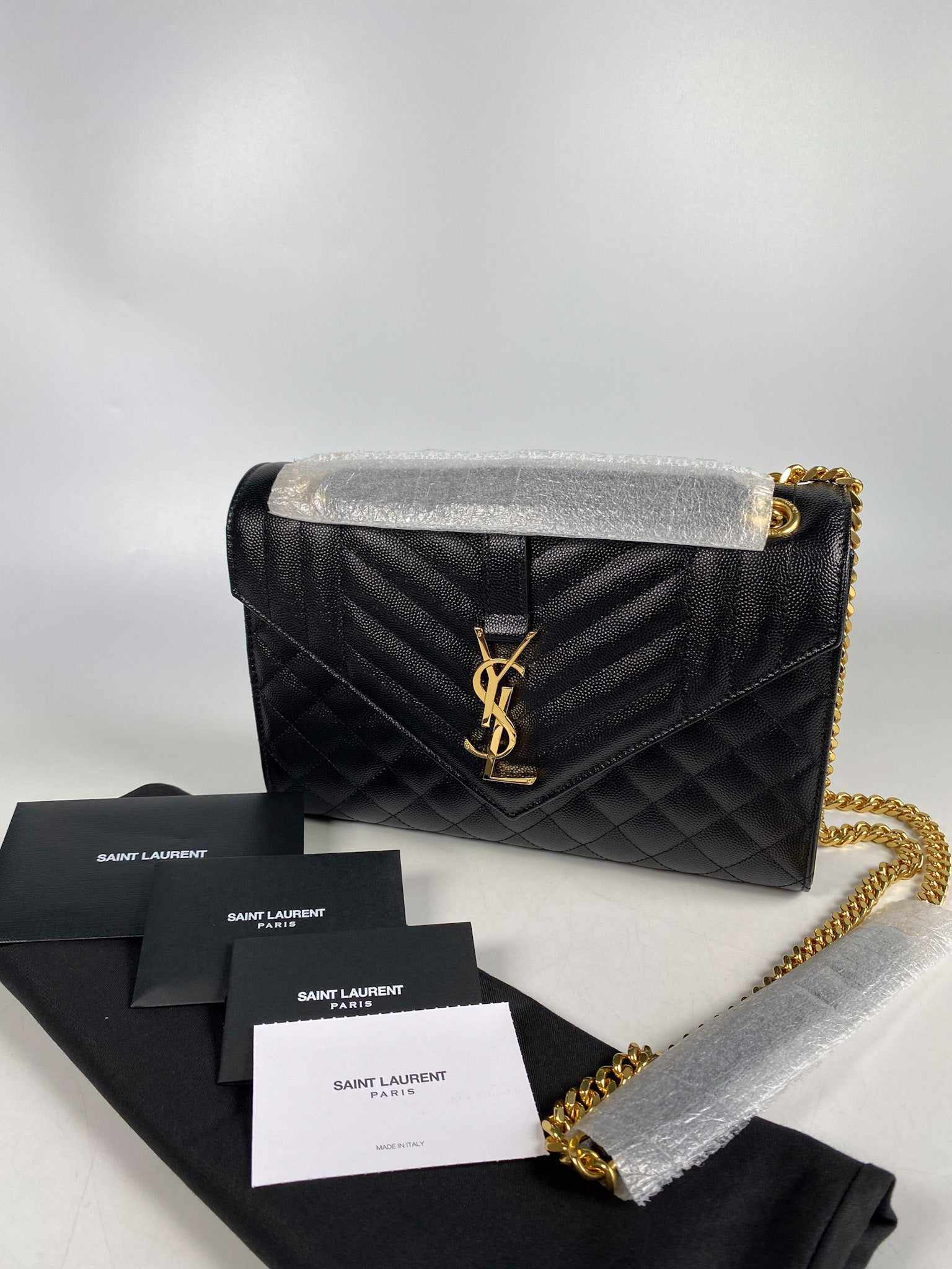 Saint laurent medium store embossed leather envelope bag