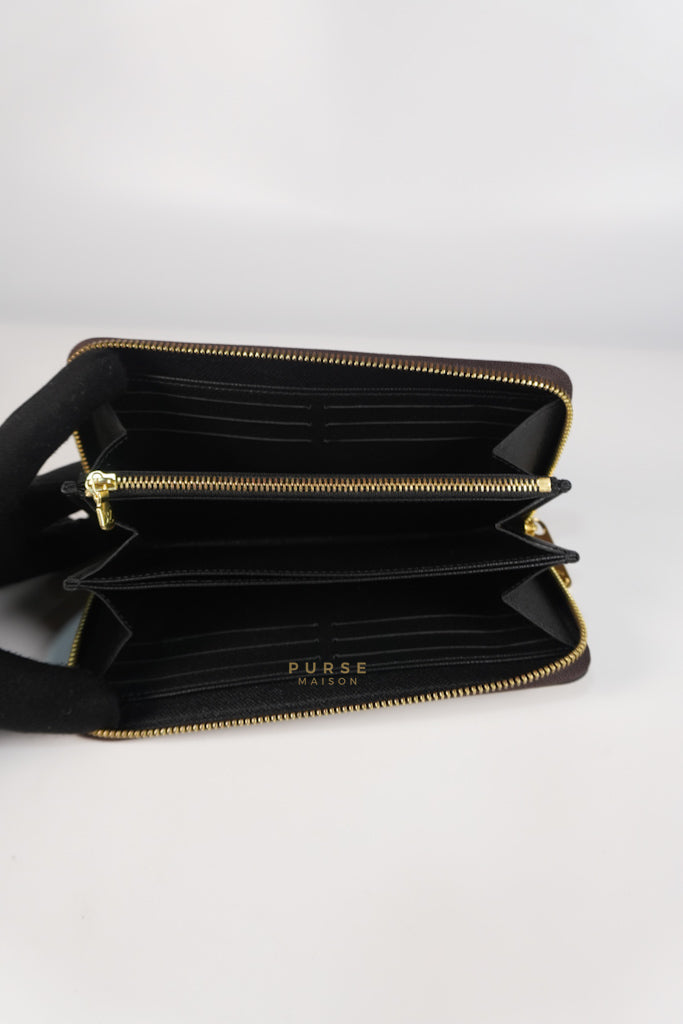 Zippy Long Wallet in Reverse Monogram Canvas (Microchip) | Purse Maison Luxury Bags Shop