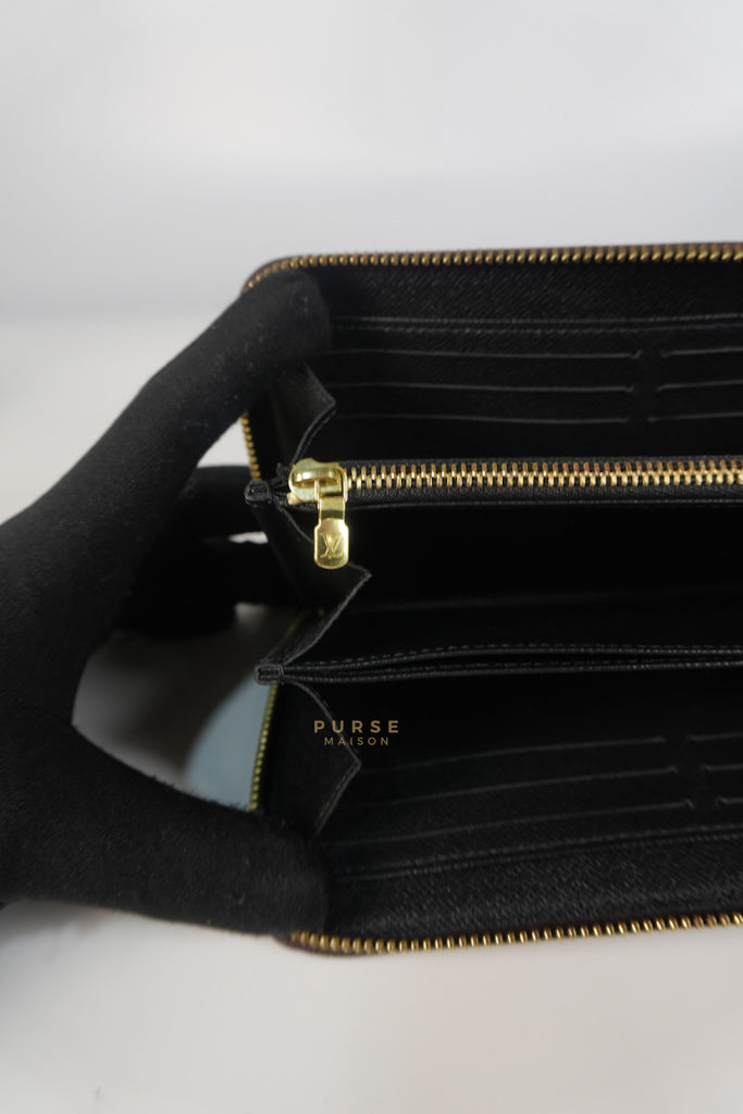 Zippy Long Wallet in Reverse Monogram Canvas (Microchip) | Purse Maison Luxury Bags Shop