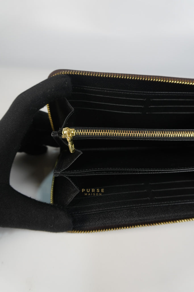 Zippy Long Wallet in Reverse Monogram Canvas (Microchip) | Purse Maison Luxury Bags Shop
